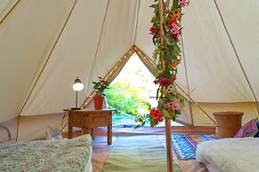 Wood Cabin & 4 Large Bell Tents - Hapus Hideaway