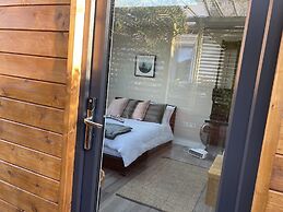 Contemporary Guest House With Outside Barrel Sauna