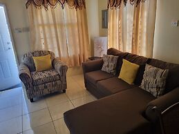 Charming 2-bed House in Portmore Gated Community