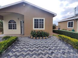 Charming 2-bed House in Portmore Gated Community