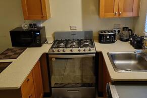 Charming 2-bed House in Portmore Gated Community