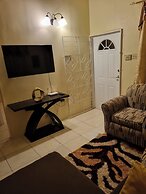 Charming 2-bed House in Portmore Gated Community