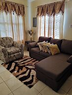 Charming 2-bed House in Portmore Gated Community