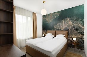 Elisabeth Downtown Apartments by UrbanRent