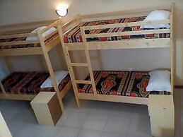 Room in Guest Room - Bed in Mixed Dormitory Room in Vila do Maio