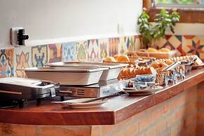 Velinn Pousada Iguana Azul