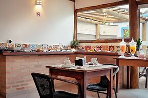 Velinn Pousada Iguana Azul