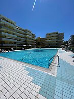 Holiday by the Pool in our Cozy Flat - Beahost