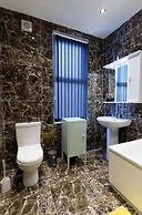 Dior House Apartments