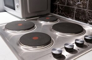 Dior House Apartments