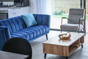 Stylish Coastal Oasis by Sea N' Rent