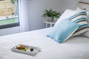 Stylish Coastal Oasis by Sea N' Rent