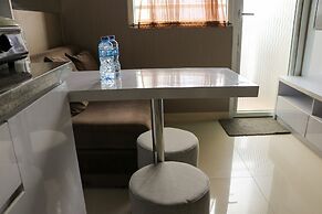 Homey And Cozy Stay 2Br At Green Pramuka City Apartment