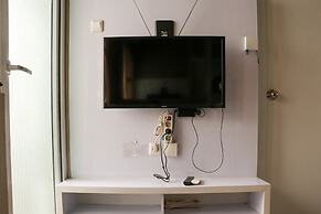 Homey And Cozy Stay 2Br At Green Pramuka City Apartment