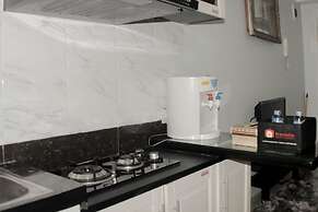 Minimalist And Homey 1Br At Bassura City Apartment