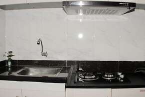 Minimalist And Homey 1Br At Bassura City Apartment
