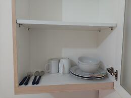 Cozy And Minimalist Studio (No Kitchen) At Aeropolis Apartment