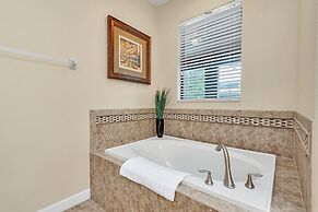 Warm and Inviting Family Villa! Themed Rooms, Movie Room and Upstairs 