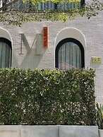 M Village The Compound