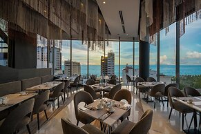 Draco Hotel & Suites