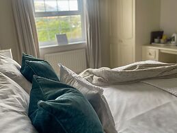 Ty Afon, River House