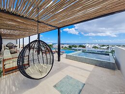 Kaab by the Beach. Condo with roofpool