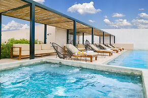 Kaab by the Beach. Condo with roofpool
