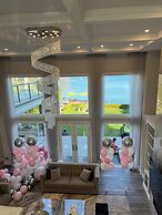 New Waterfront Mansion by Simply Comfort