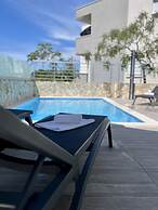 Sunny apartment with a Private Pool