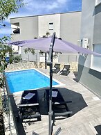 Sunny apartment with a Private Pool