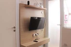 Well Designed And Serene 2Br At Green Pramuka City Apartment