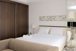 Warm And Cozy Studio At Azalea Suites Apartment