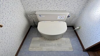 Yellow House by Lake Toya