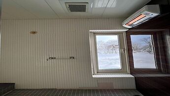 Yellow House by Lake Toya