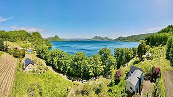 Yellow House by Lake Toya