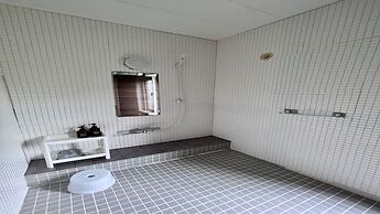 Yellow House by Lake Toya