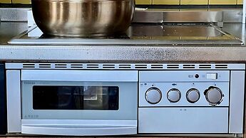 Yellow House by Lake Toya