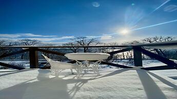 Yellow House by Lake Toya