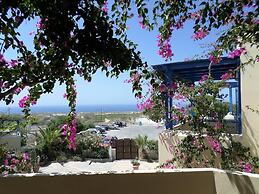 Santorious Flower Covered Apartment