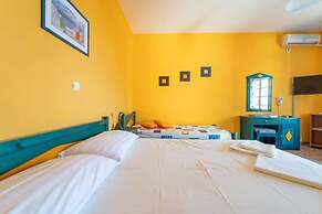 Santorious Flower Covered Apartment