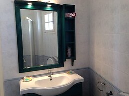 Santorious Flower Covered Apartment