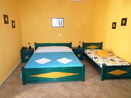 Santorious Flower Covered Apartment