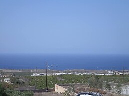 Santorious Flower Covered Apartment