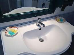 Santorious Flower Covered Apartment