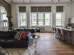 The Wilfred Suite Stone Cross Mansion