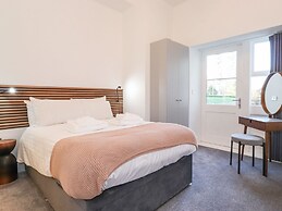 The Wilfred Suite Stone Cross Mansion