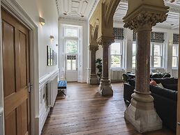 The Wilfred Suite Stone Cross Mansion