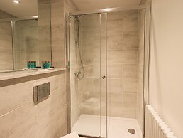 The Wilfred Suite Stone Cross Mansion