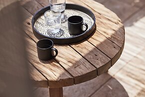 Noma Milos - Delmar Collection