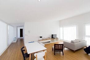 De la Costa Apartamento